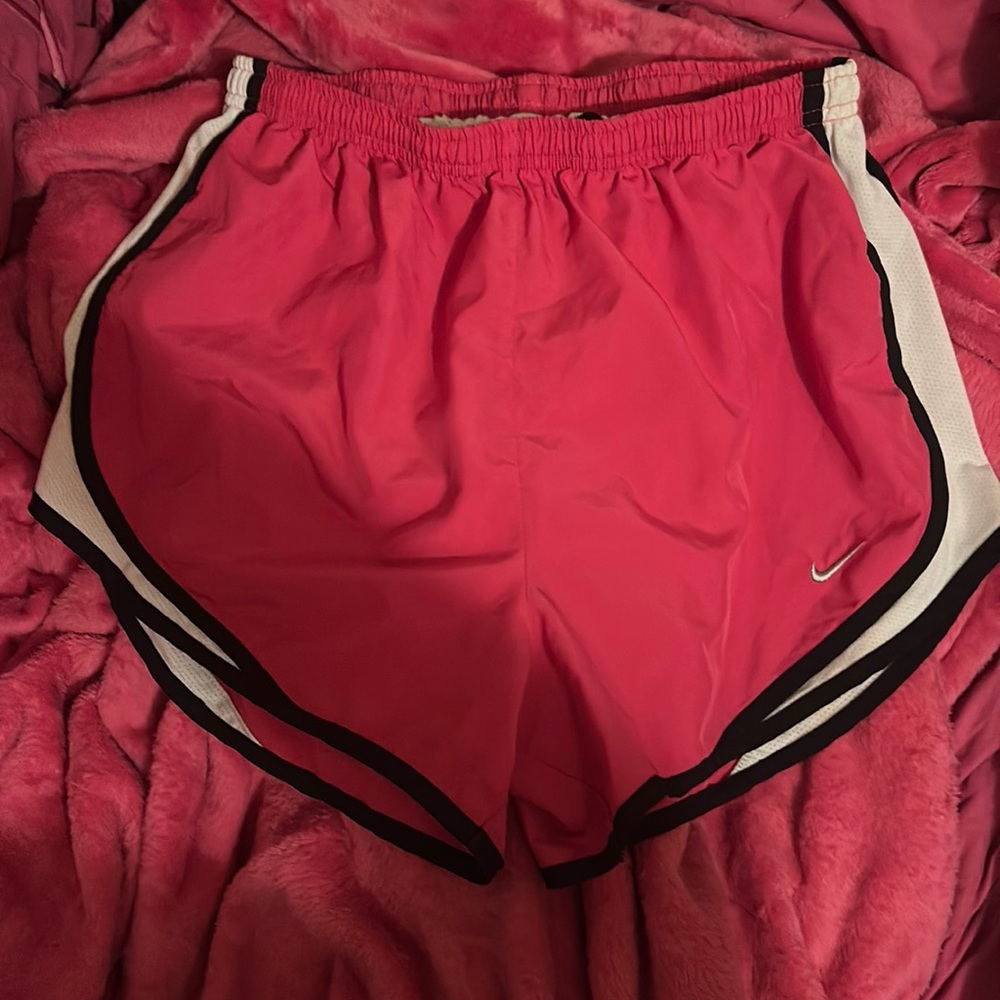 Woman’s medium pink Nike jogging shorts